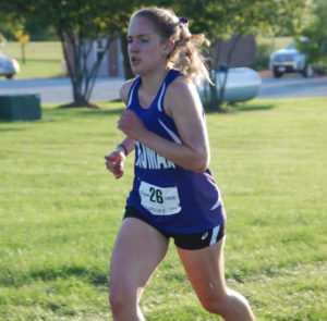 Erica running at a track meet